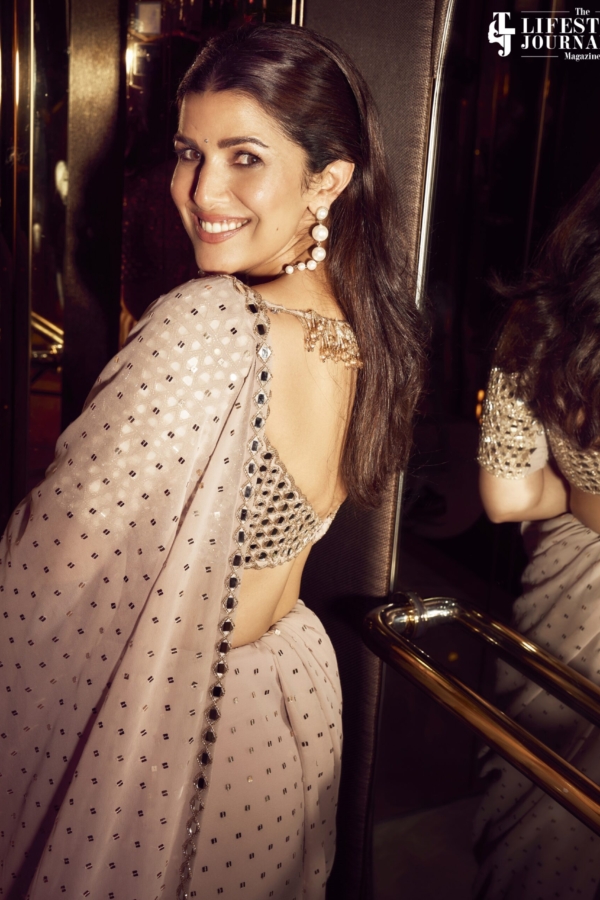 NIMRAT KAUR In Pink (ash) Georgette Frill Saree Set