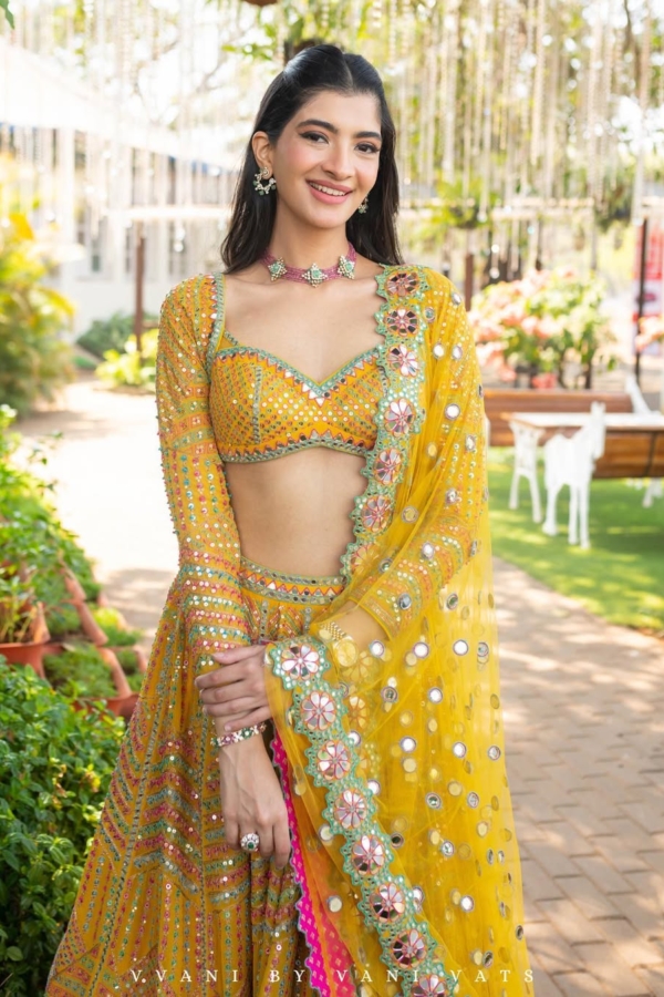 Yellow Heavy Multi Color Lehenga Set (HANNA KHAN)