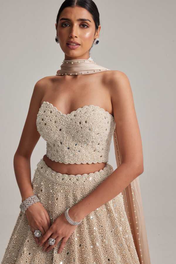 Light Beige Dense mirror and pearl Corset lehenga set With Stole