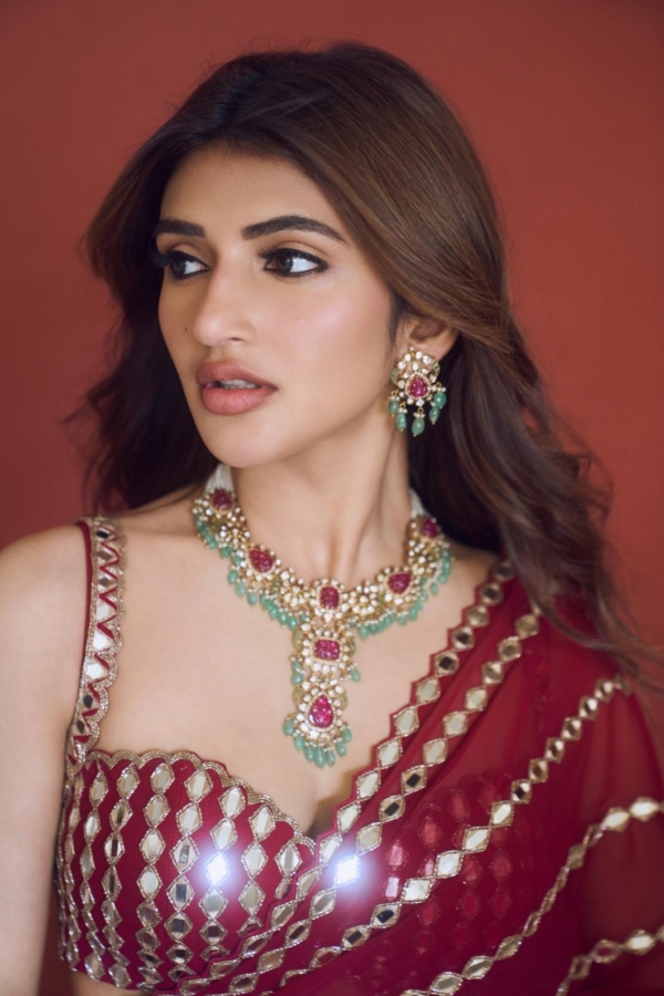 SREELEELA IN Ruby red Linear Mirror Saree Set
