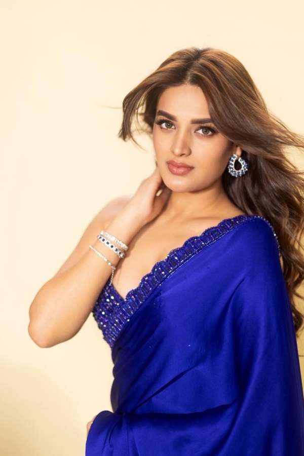 Nidhhi Agerwal in Cocktail Blue Satin Saree Set