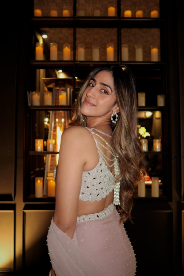Zaara Gidwani in Ash pink Pearl Scattered draped skirt set