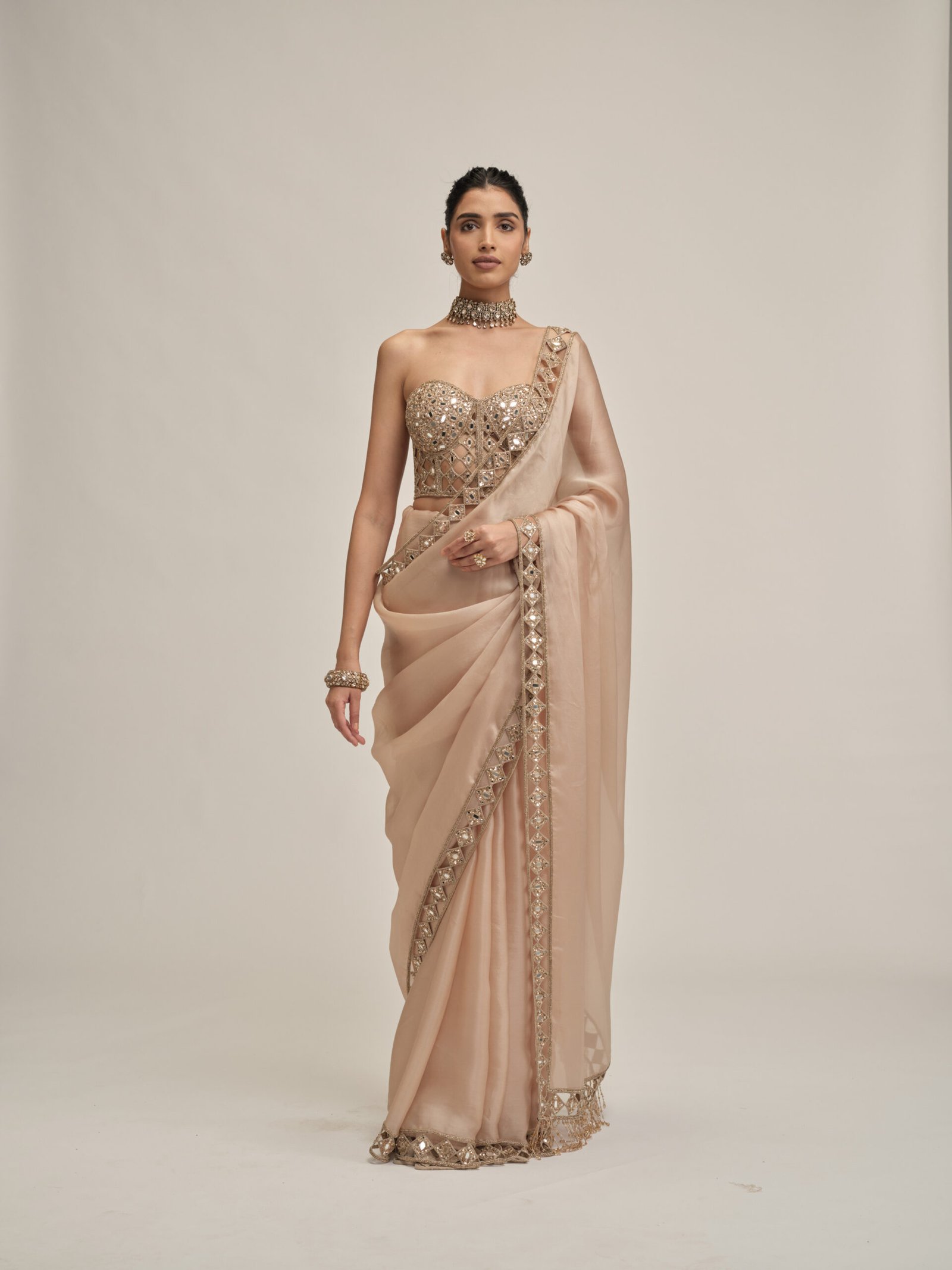 LIGHT BEIGE CUTWORK BORDER SAREE WITH CORSET SET