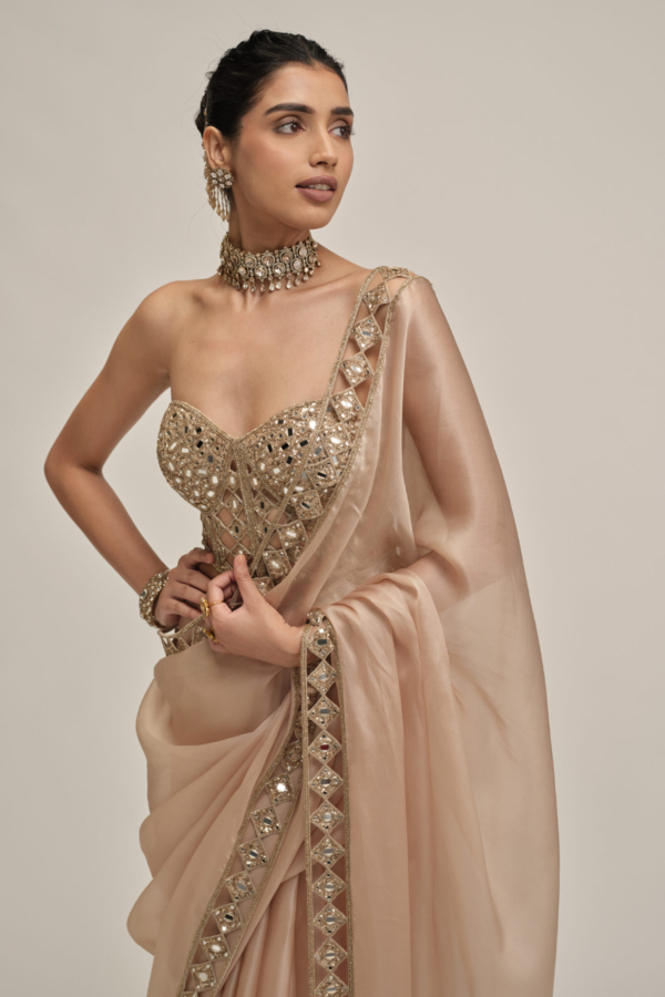LIGHT BEIGE CUTWORK BORDER SAREE WITH CORSET SET