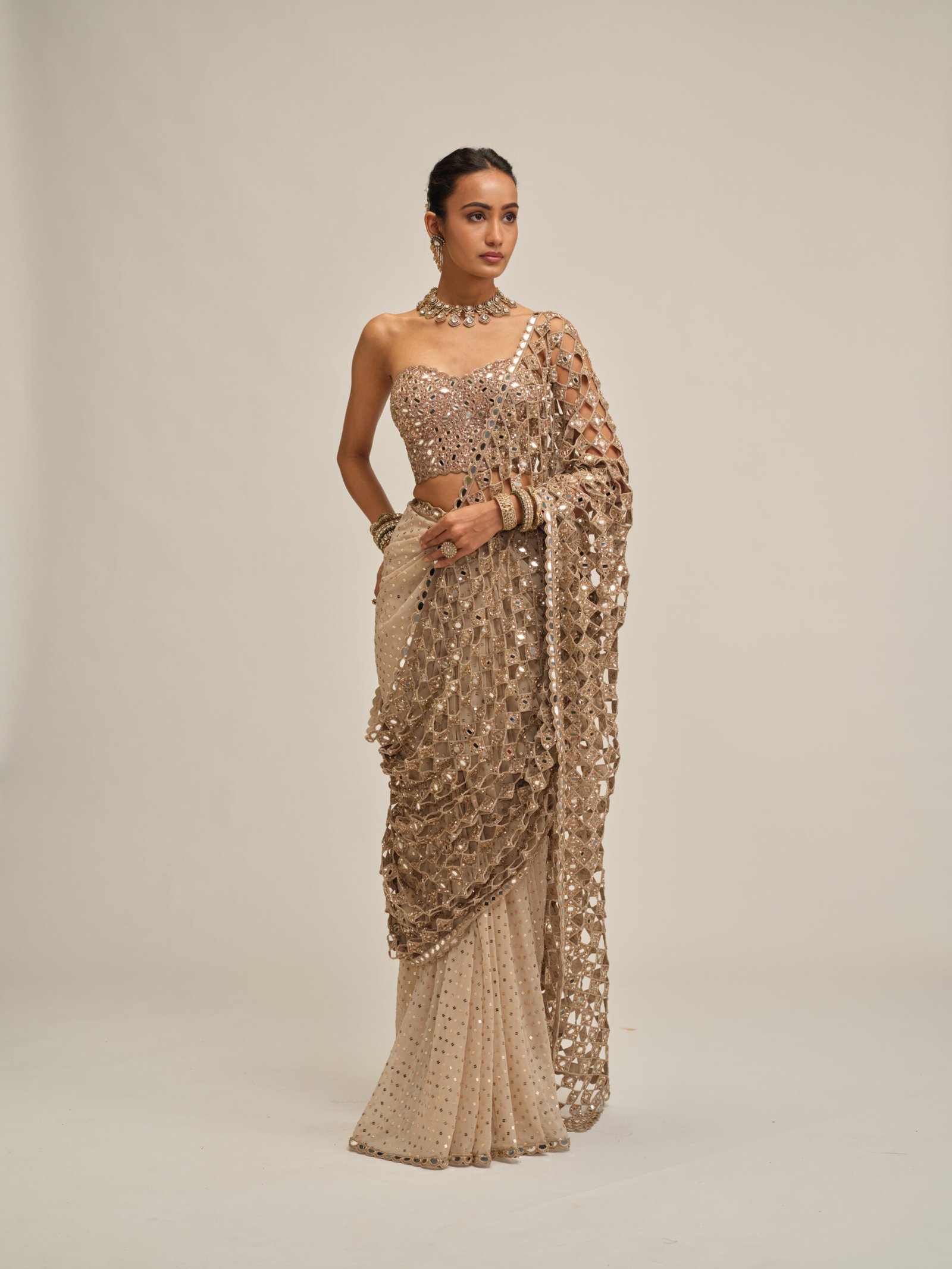 LIGHT BEIGE CUTWORK PALLU SAREE WITH CORSET SET