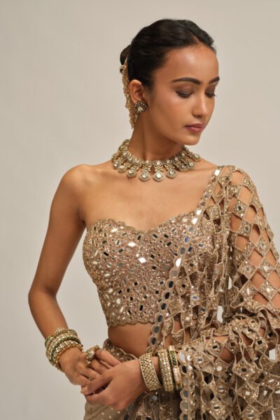 LIGHT BEIGE CUTWORK PALLU SAREE WITH CORSET SET